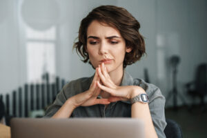 woman thinking how to handle rejections