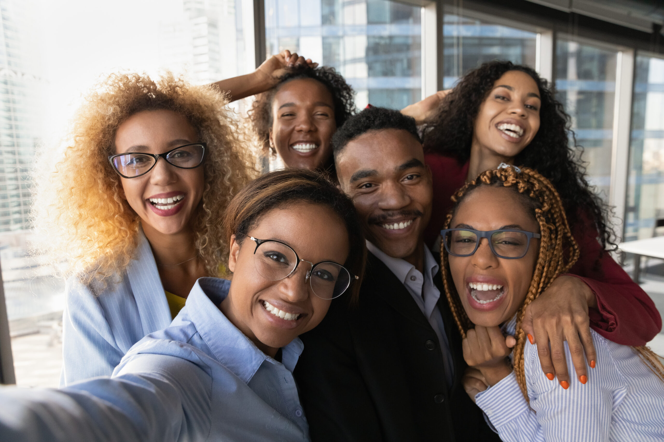 Close,Up,Portrait,Of,Overjoyed,Young,Multiracial,Employees,Team,Have